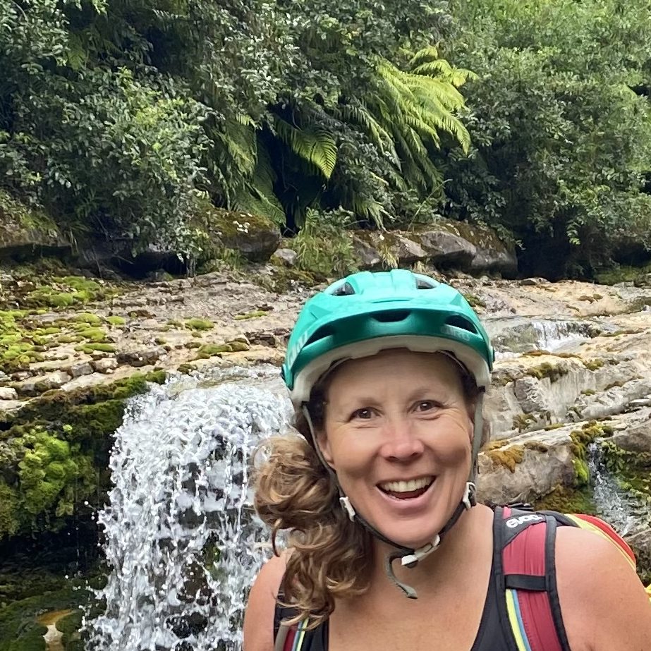 Cordelia outdoors by a waterfall